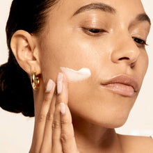 Load image into Gallery viewer, Model applying Microbiome Restorative Evening Moisturizer.